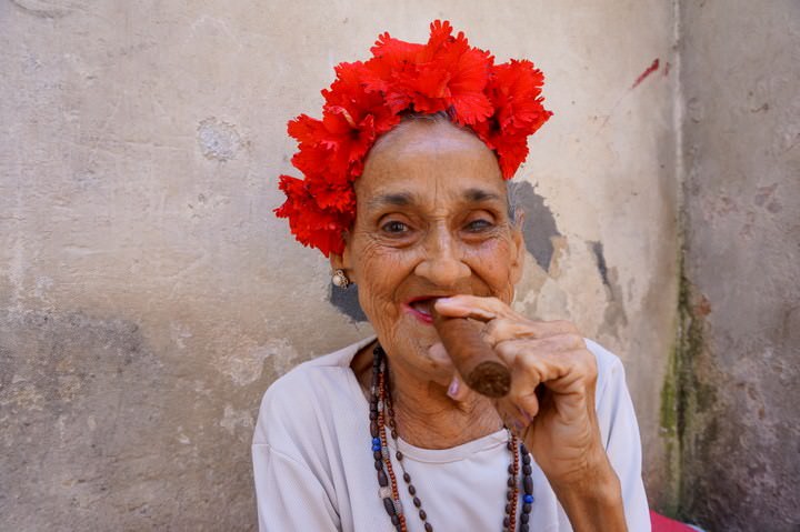 Woman Smokes Cigar in Havana, Cuba
