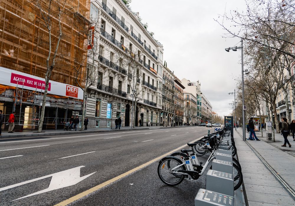 Electric bikes lined-up on the street in Madrid.