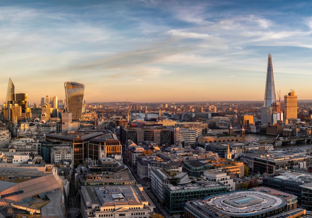 Panoramic view over the skyline of London, UK during sunset time from the city to the tower.