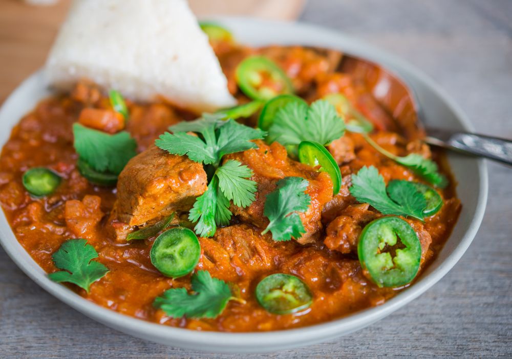 On the table is a Kenyan beef curry. 