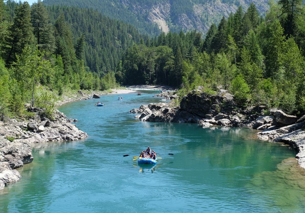 Tourists are enjoying whitewater rafting in Montana.