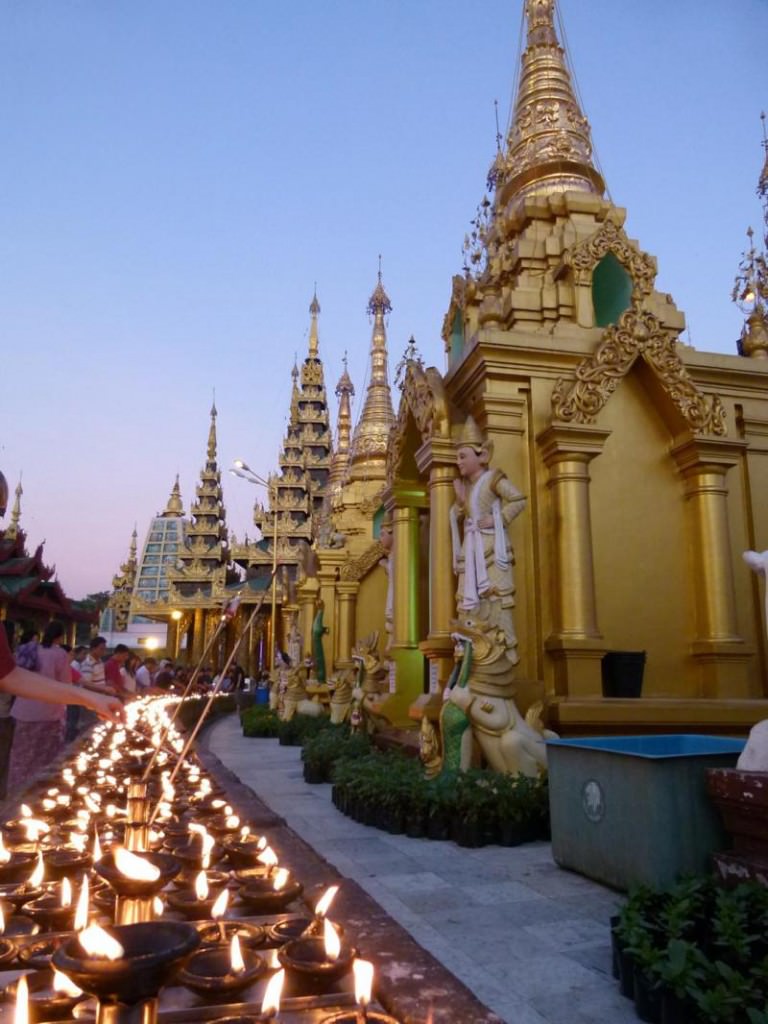 candles lit up at Shwedagon Paya in Yangon