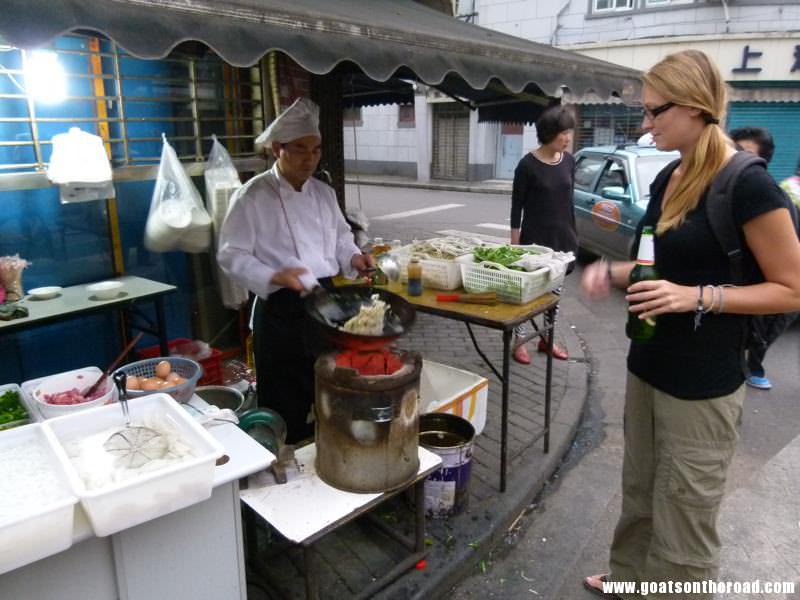 Budget Backpacking Couple In Shanghai