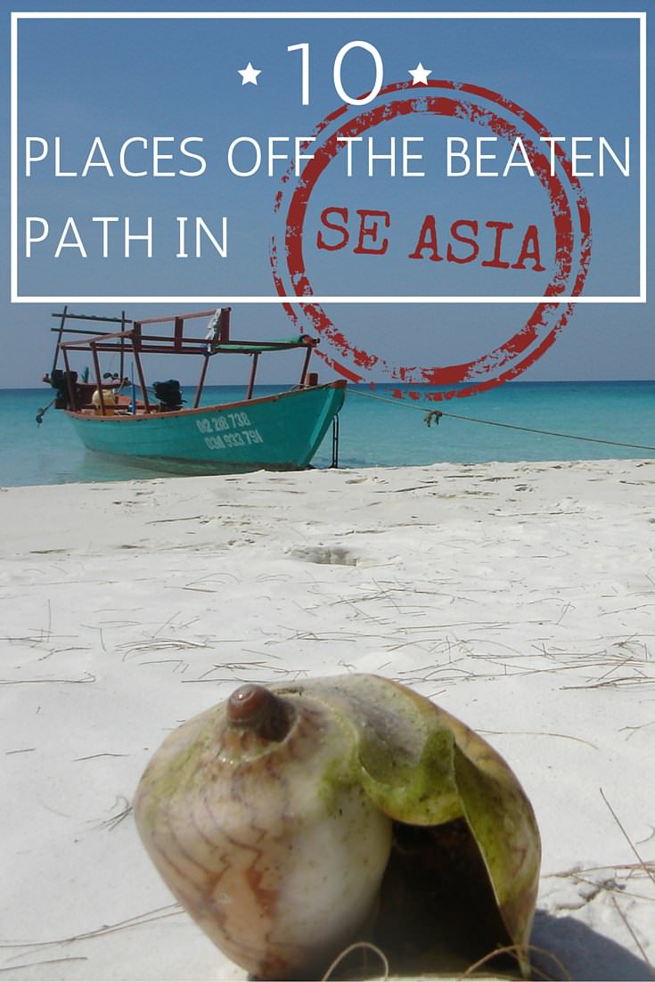 Shell on beach with boat and sea in background with text overly off the beaten path in SE Asia