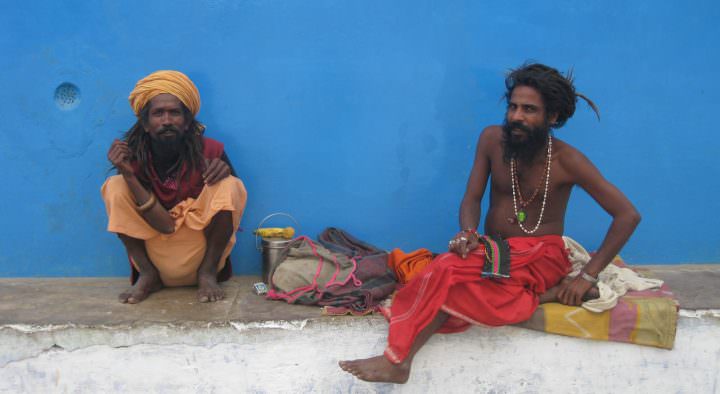 Two friends hanging out on the street in India