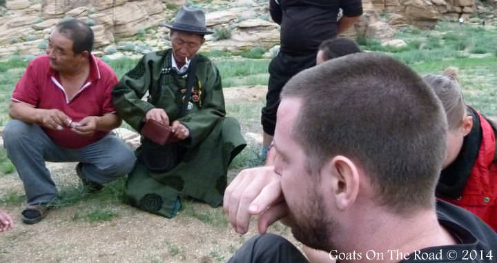 Trying Snuff With The Local Nomads In The Gobi Desert when traveling mongolia