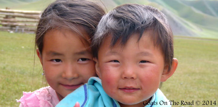 Mongolian Kids on the steppe traveling Mongolia