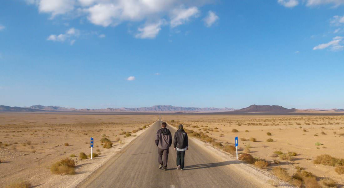 how to make money from home. Our story. Walking down road in Iran