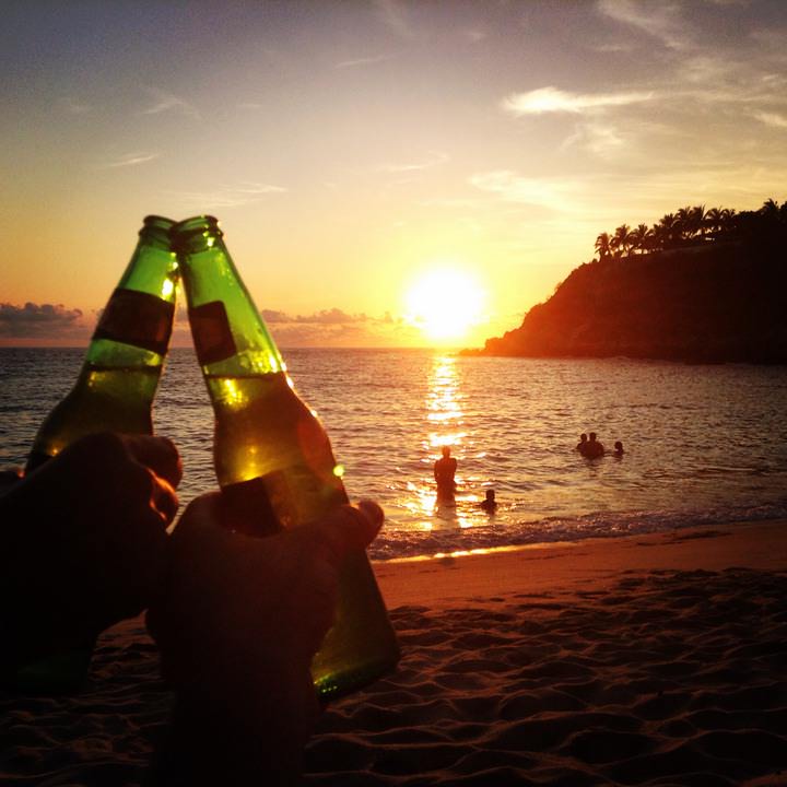 Beer at sunset on Carizalillo Beach, Puerto Escondido, Oaxaca