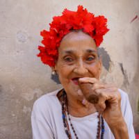 Woman Smokes Cigar in Havana, Cuba