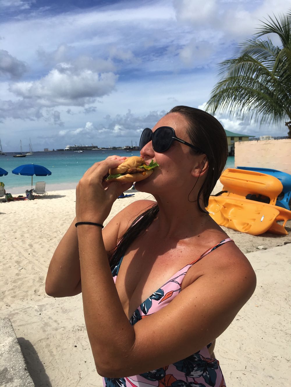 Enjoying a fish cutter at Carlisle Beach in Barbados