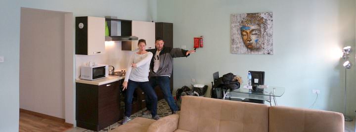 Nick and Dariece from Goats On The Road dancing in their new Airbnb in Malta