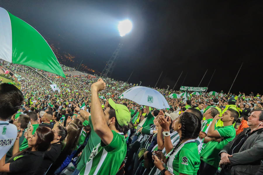 Fans of Atletico Nacional celebrate at the end of a second leg