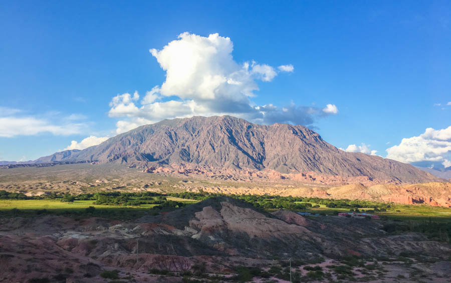 travel to cafayate argentina watch sunset from a mountain