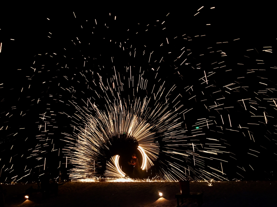 things to do in thailand watch a fire twirling show