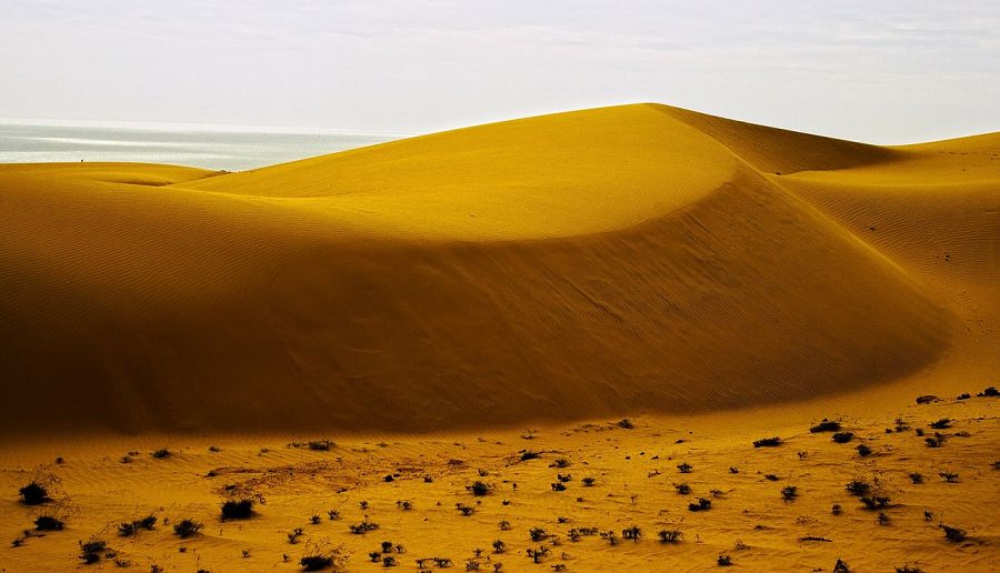 Tall sand dunes near the beach in Mui Ne, Vietnam