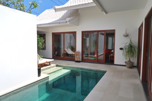 The pool outside our villa in Canggu, Bali, one of the cheapest places to live in the world