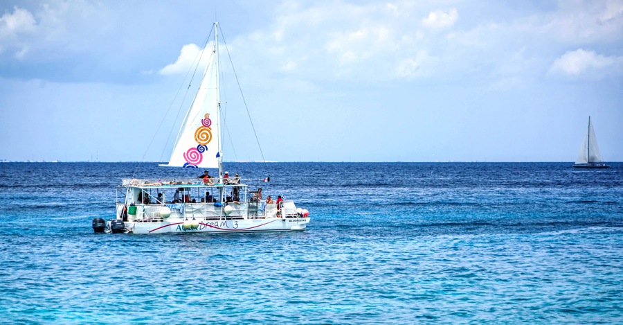 things to do in cozumel go sailing on a catamaran