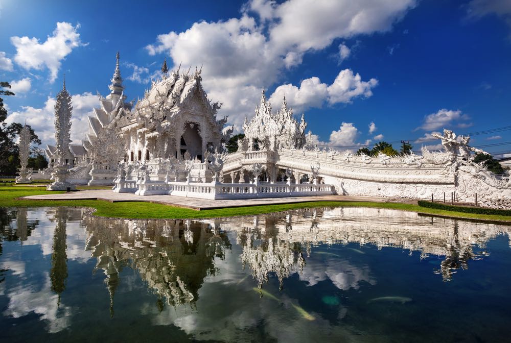 visiting chiang rai's temple is one of the best places to visit in thailand