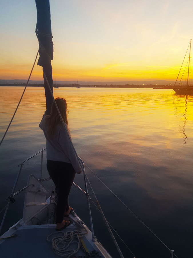 living on a sailboat watching sunset