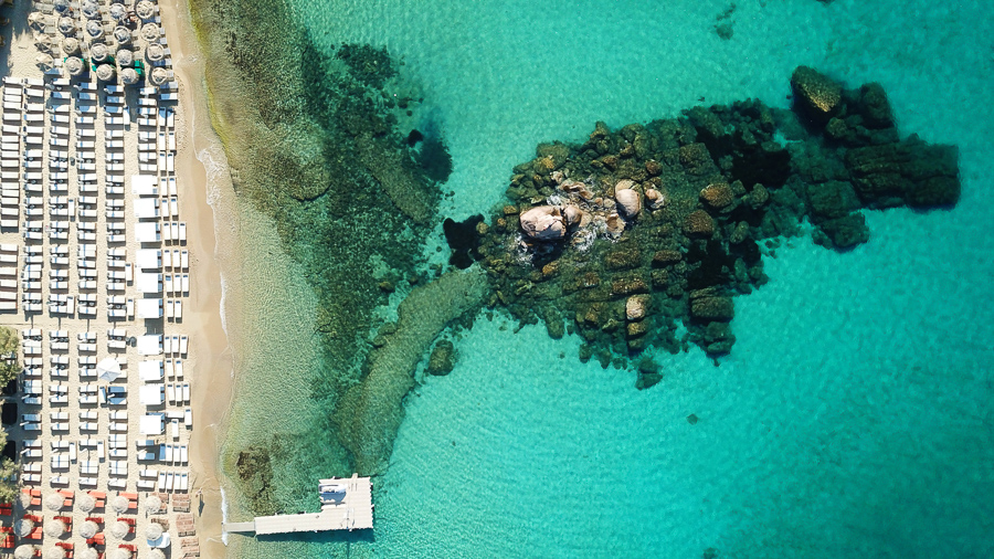 laying on the beach is one of the best things to do in mykonos