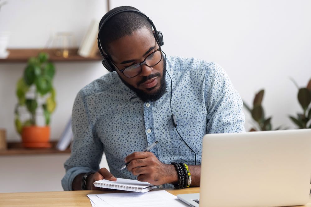 A headset with microphone is essential teaching English equipment.