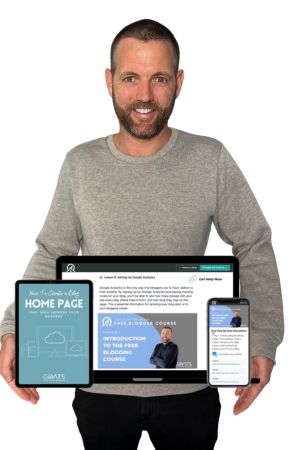 Nick holding the contents of his Free Blogger Course