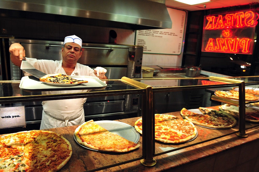 eating pizza in new york city on a weekend trip