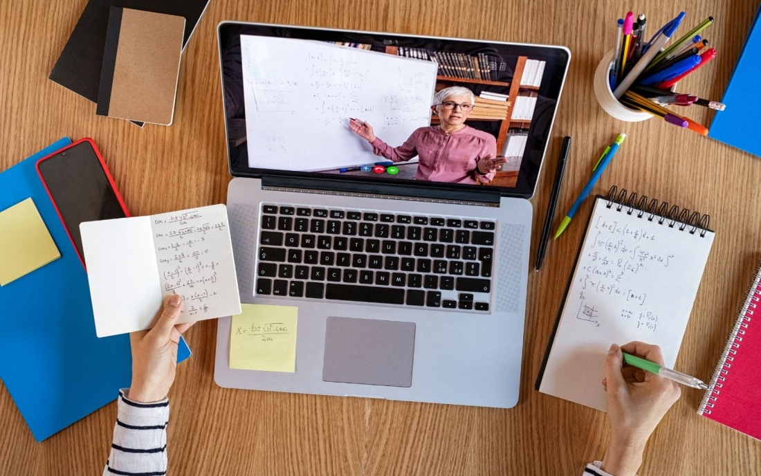 woman at a laptop taking an online course