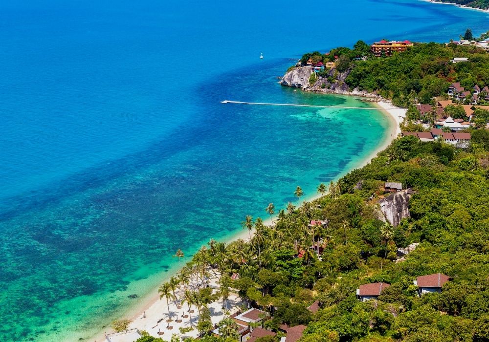 The beautiful beach at Koh Phangan is one of the best places in Thailand for digital nomads