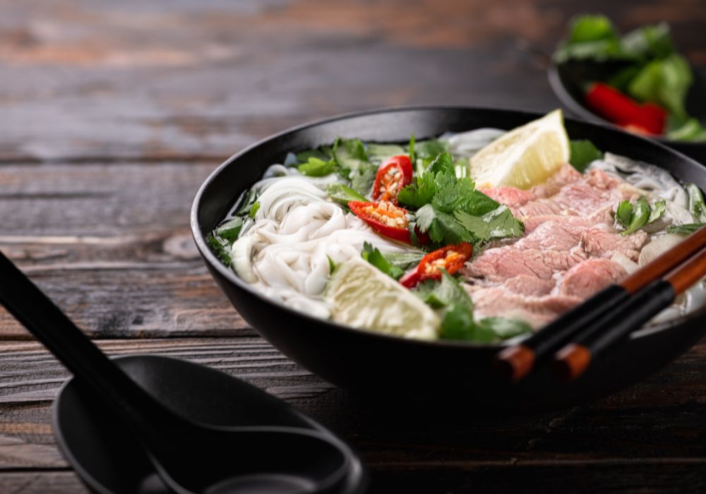 Pho bo Vietnamese soup with beef and rice noodles.