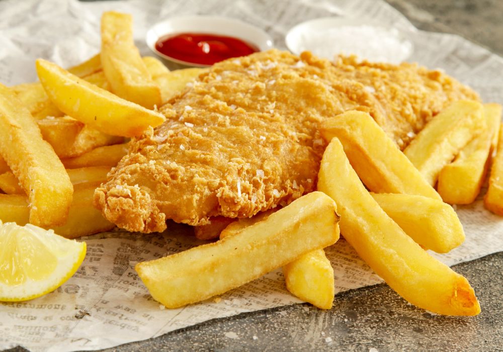 A traditional British buttered fish and chips on weekend in London