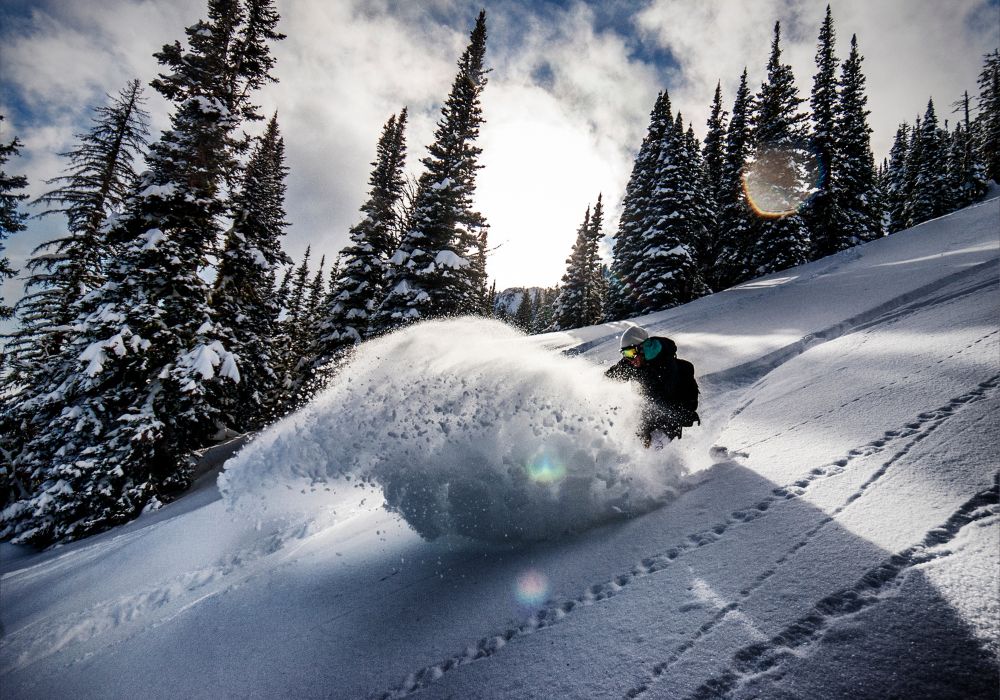 A skier has fun skiing at Bridger Bowl.