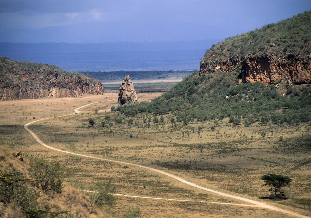 Hells Gate National Park with the 'tower' in the distance and Lake Naivasha in Kenya.