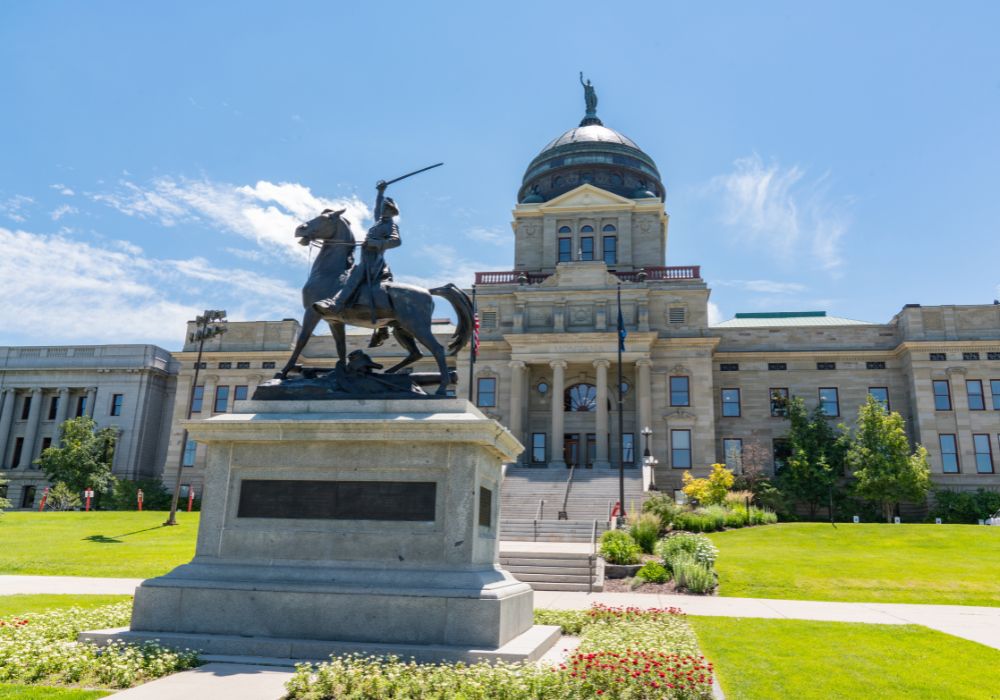 Thomas Francis Meagher Statue at the Montana State Capital Building in Helena, Montana on a clear blue sky.