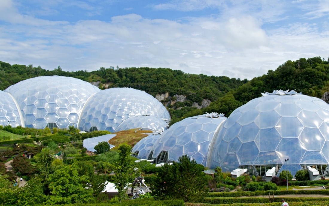 The Eden Project is a dramatic global garden housed in tropical biomes that nestle in a crater.