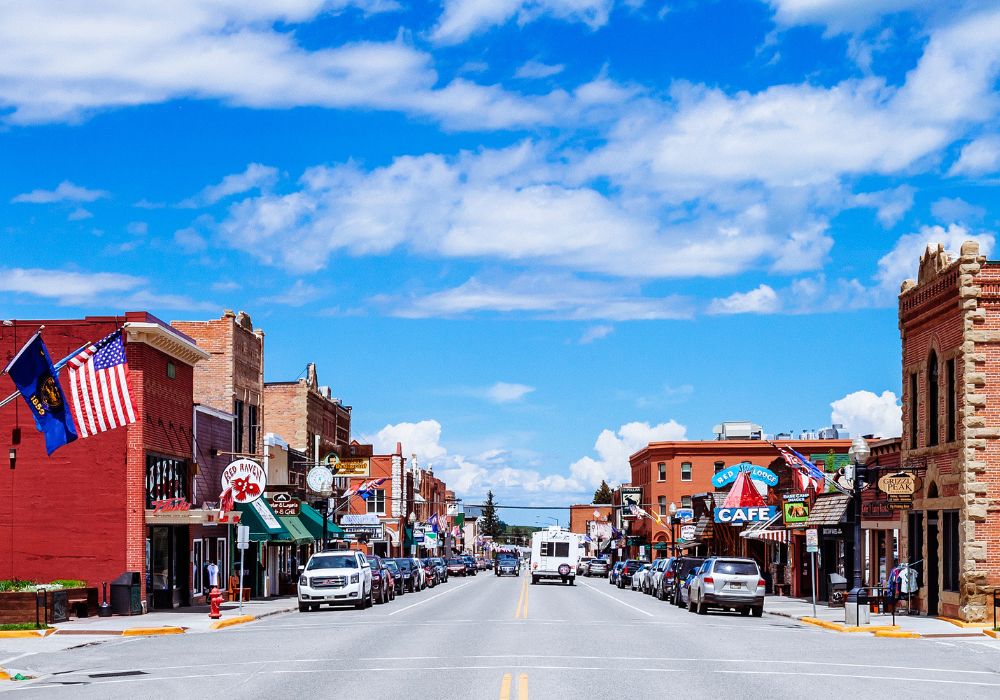 A beautiful neighborhood in Red Lodge, Montana in the summertime with a clear blue sky.