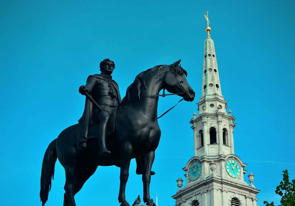 St Martin in the Field church in Trafalgar Square in London with statue.