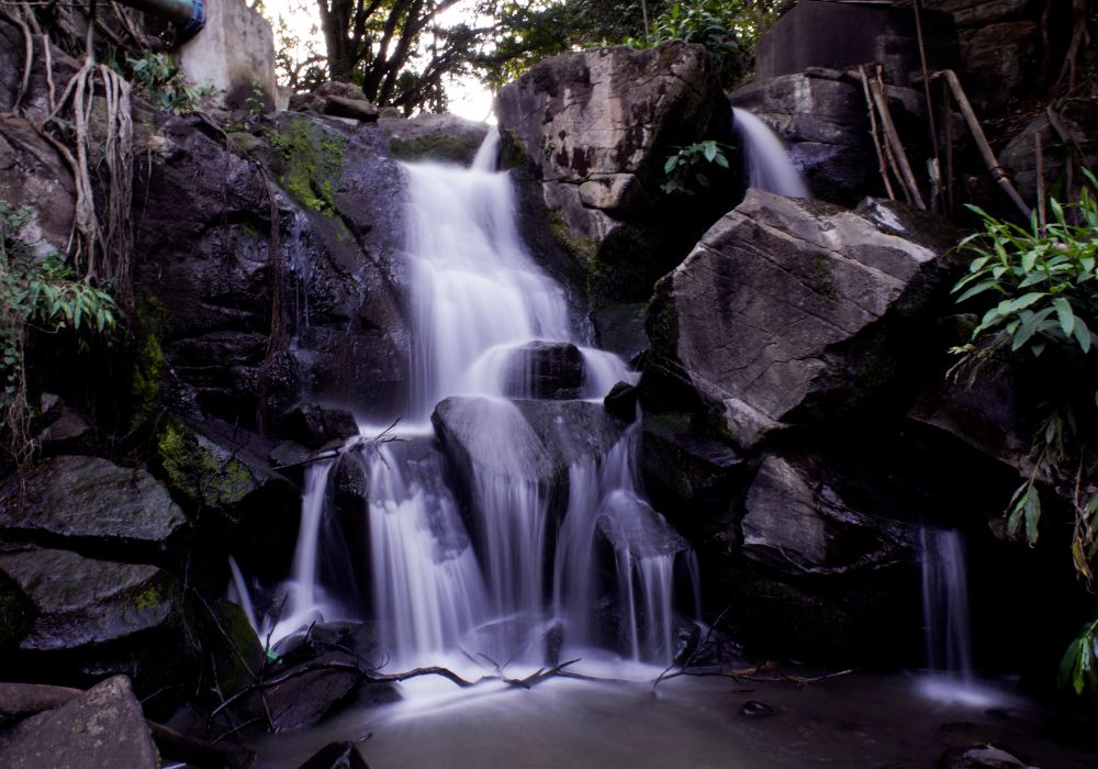 A stunning Oloolua waterfall in Kenya after a long trail walk.