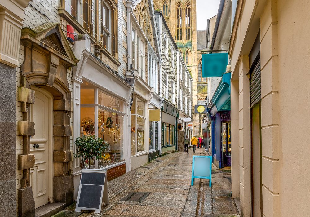 Shops in Cathedral Lane with views of the Cathedral spires.