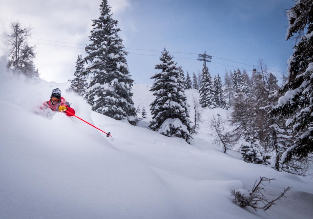 Skiing down the powdery slopes of Montana mountains.