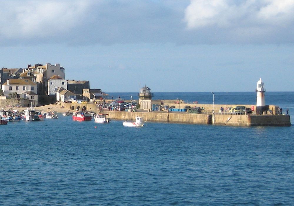 A distant view of a Cornwall harbor.