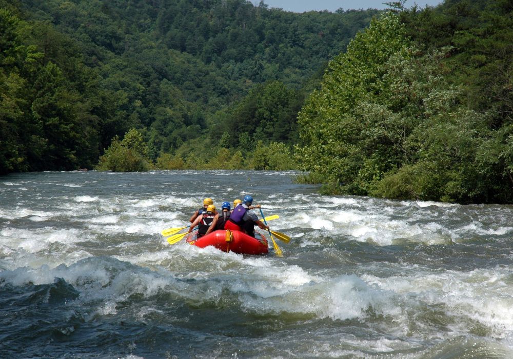 A group of people on a whitewater rafting tour in Montana.
