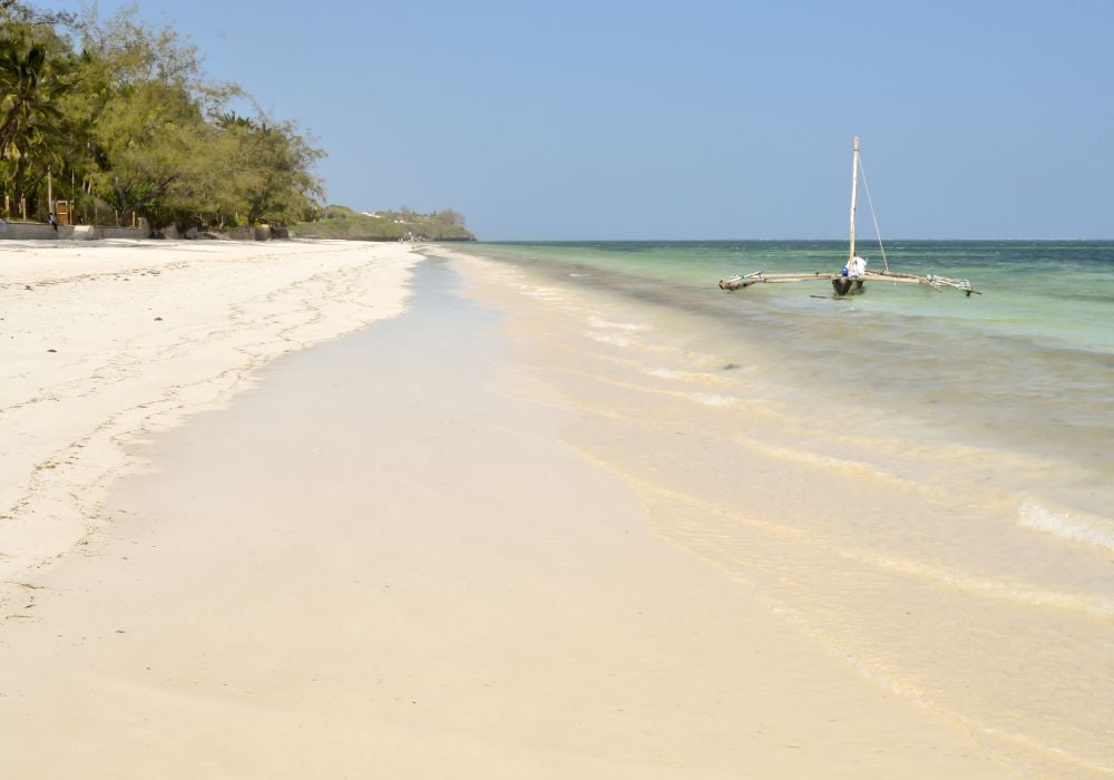 Bamburi sandy beach with a ditch near Mombasa in Kenya.