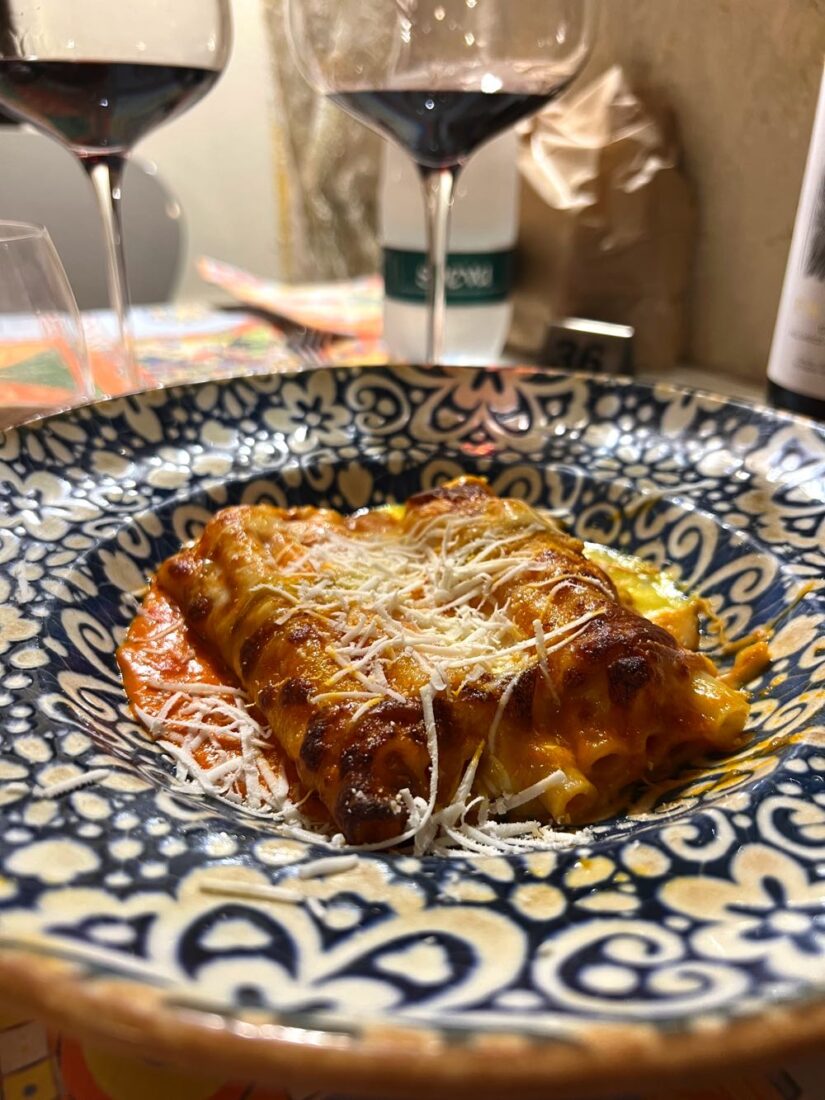 pasta dish with wine at restaurant in matera