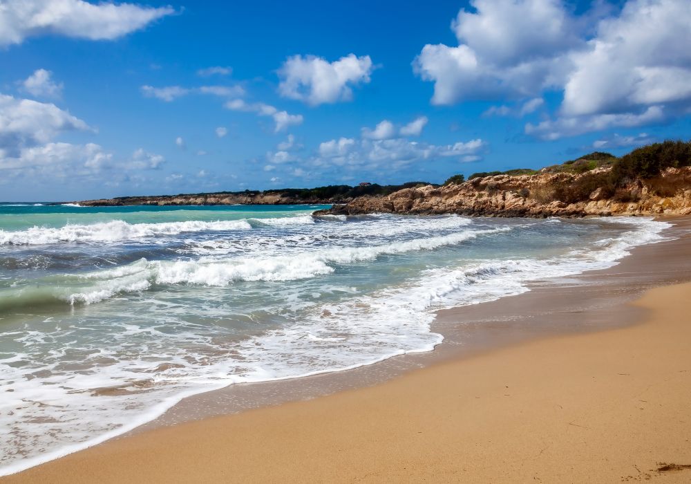 A coastline resort of white sand beach of Coral Bay in Paphos, Cyprus