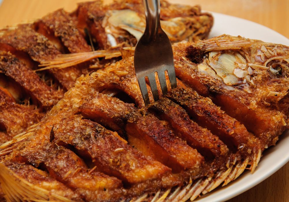 Fried Tilapia fish on a plate