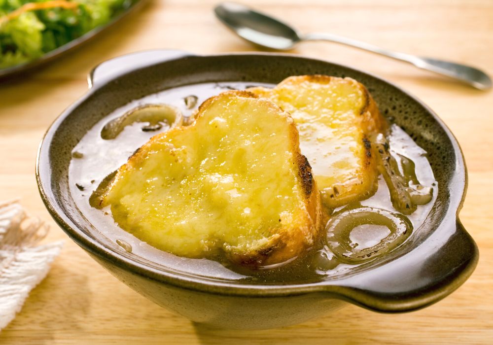 A bowl of French onion soup also known as Soupe à l'Oignon