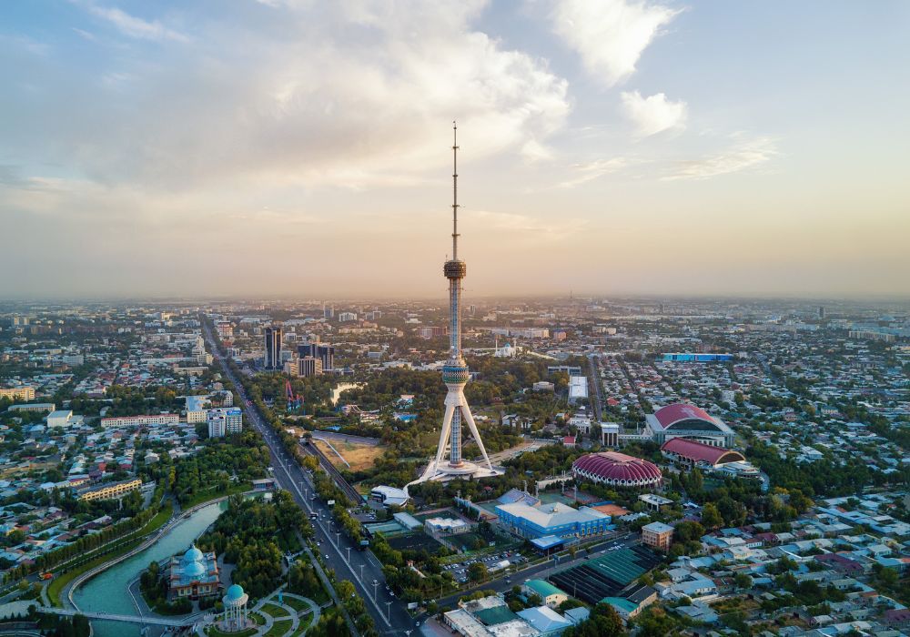 The beautiful skyline of Tashkent TV Tower aerial shot during sunset in Uzbekistan.
