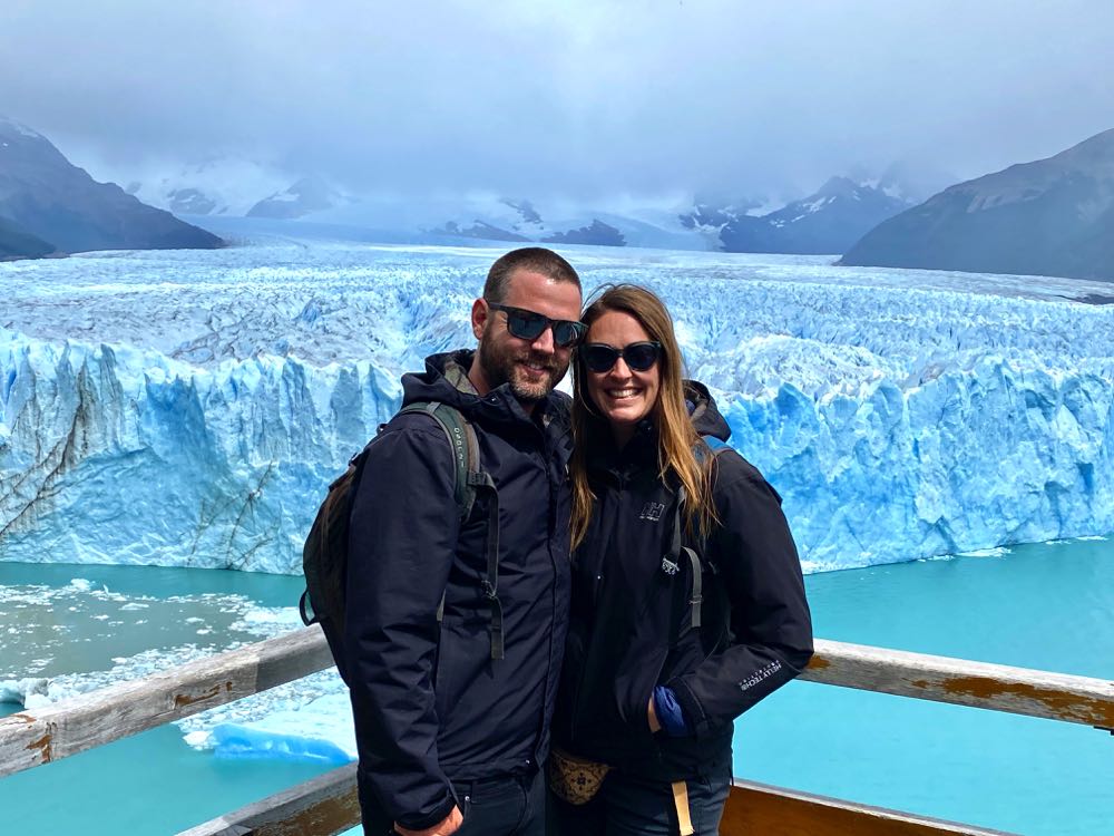 standing in front of perito moreno glacier in argentina